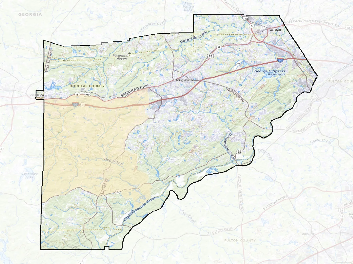 Topographic map of Douglas County. Douglasville sits on the Interstate 20 corridor through the middle, Villa Rica on the western line and Austell on the north eastern one. Dog River runs through the shaded watershed across the south west, with Sweetwater, Gothards, Anneewakee and Bear Creeks and the Chattahoochee on the south eastern boundary. The surrounding counties are faded back.